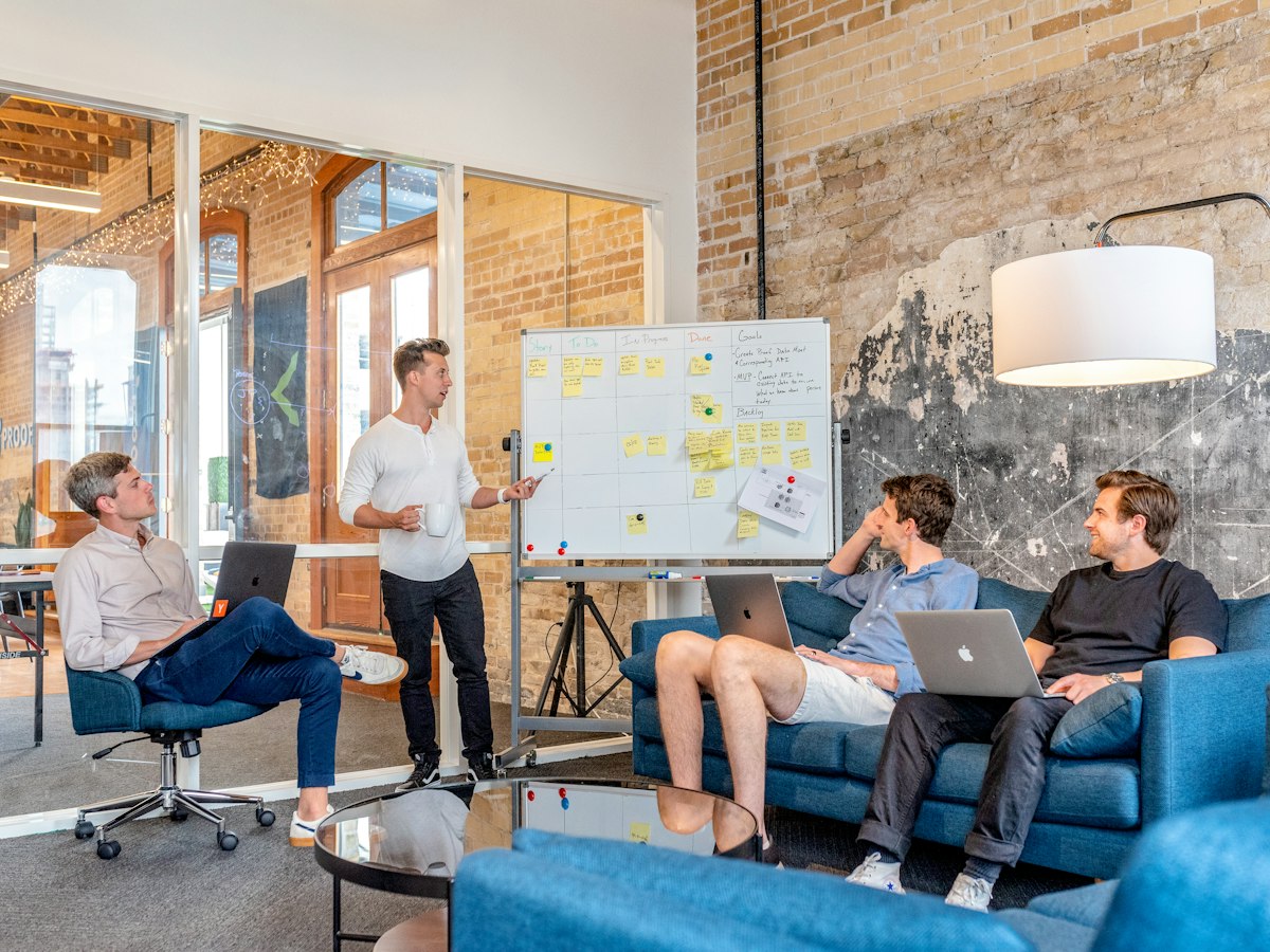 Digital marketing team collaborating on performance advertising strategy